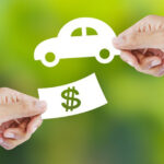 Hands exchanging 2D car and cash representing Volvo financing