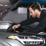 Technician working on a Volvo oil changed