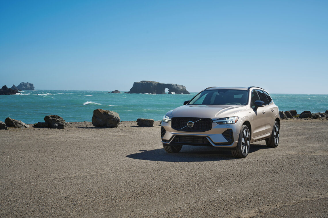 A pre-owned Volvo vehicle parked near the coast